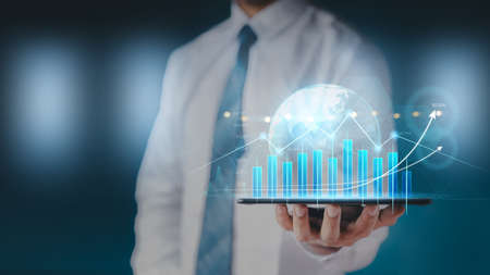 Money businessman touch virtual screen screen displaying a crypto currency featuring stock tickers or graphs. Stock trading platform concept. professional financial. Stock market data candlesticks.の写真素材