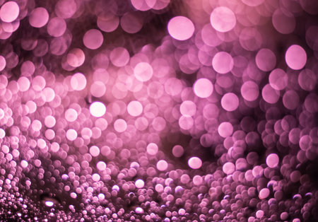 Abstract blurred purple light from water drop at the windscreen bokeh background