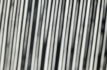 Closeup old gray cement wall background on sunlight in the afternoonの写真素材