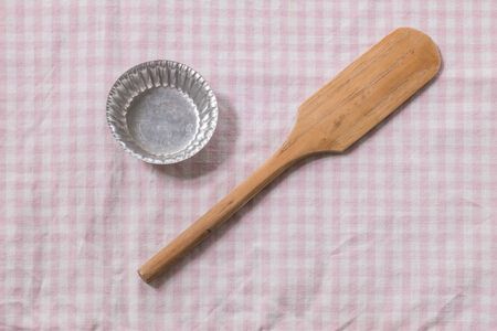 Small paddle and tray for cooking sweet tablecloth backgroundの写真素材