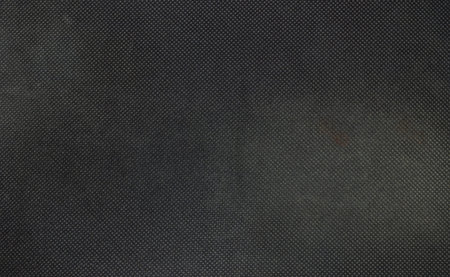 Closeup fabric at the black mouse pad background