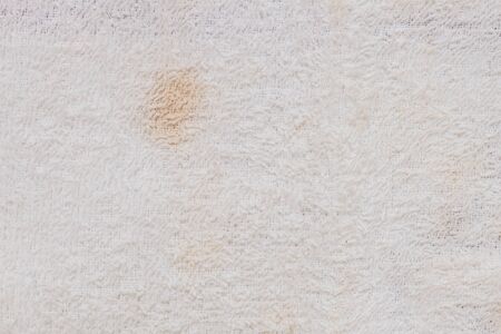 Closeup old and dirty napkin fabric backgroundの写真素材