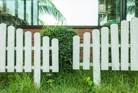 White fence in garden backgroundの写真素材