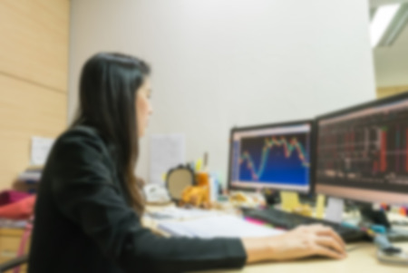 Motion blur of officer at desk in the work office backgroundの写真素材