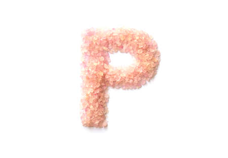 Closeup pile of pink crystal stone in P english alphabet isolated on white backgroundの写真素材
