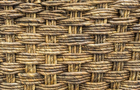 Closeup wood weaved basket texture backgroundの写真素材