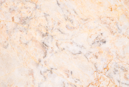 Closeup surface yellow marble floor texture backgroundの写真素材