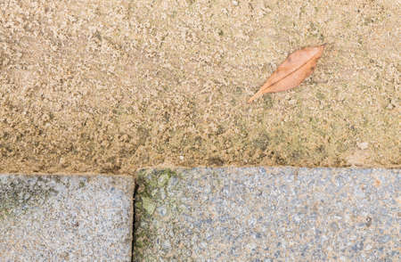 Closeup part of stone pathway with sand and soil floor backgroundの写真素材