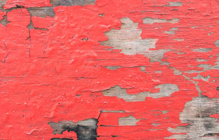 Closeup old and peeling painted wood board backgroundの写真素材