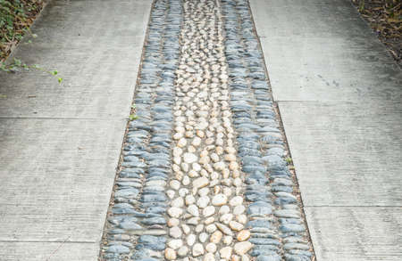 Closeup old stone pathway floor texture backgroundの写真素材