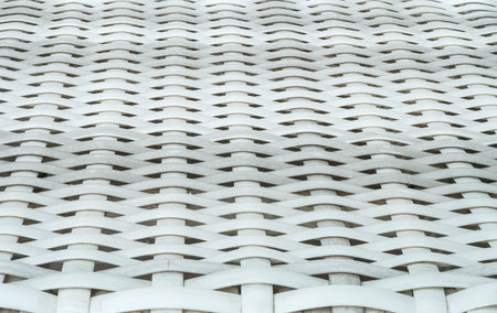 Closeup surface wood pattern at wood weave chair texture backgroundの写真素材