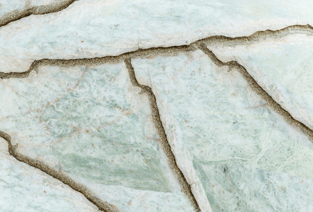 Closeup surface abstract marble pattern at the cracked marble stone floor texture backgroundの写真素材