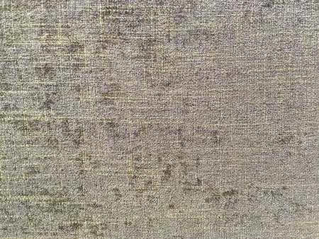 Closeup surface abstract fabric pattern at the brown fabric carpet at the sofa textured background