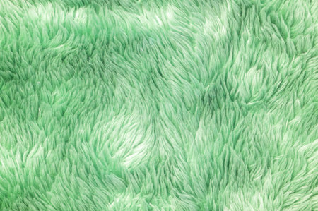 Closeup surface abstract fabric pattern at the green fabric carpet at the floor of house texture...