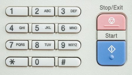 Closeup surface number keypad at the old photocopier in the office textured backgroundの写真素材