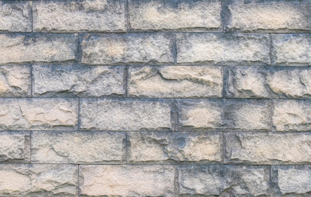 Closeup surface brick pattern at old stone brick wall textured background