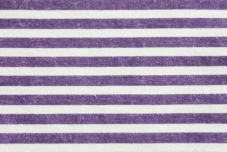 Closeup surface of white and purple fabric bag textured backgroundの写真素材