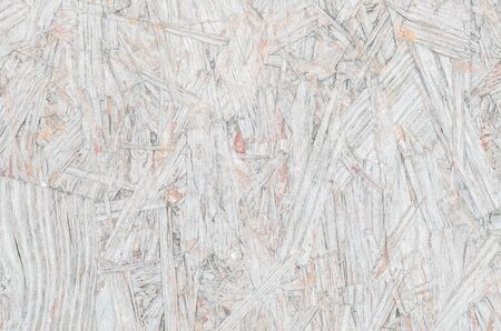 Closeup surface wood pattern at old and pale wood board at the wooden table texture backgroundの写真素材