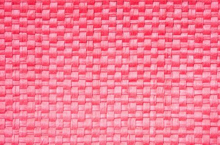 Closeup surface red wood weave bag texture backgroundの写真素材