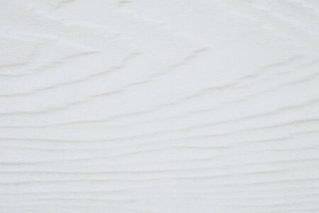 Closeup surface wood pattern at white wood board at the wall texture backgroundの写真素材