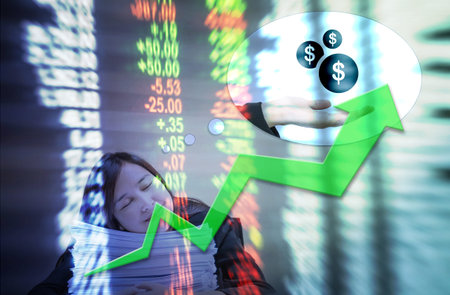 Motion blur of up trend arrow line chart with trader and computer in the marketing room on blurred...