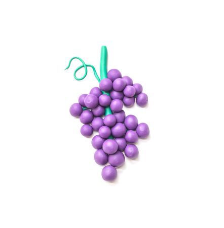 Closeup plasticine for kid in grape shape isolated on white backgroundの写真素材