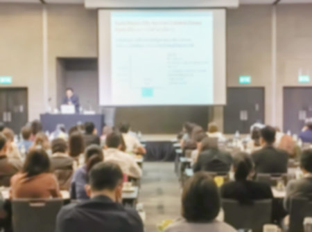 Motion blur of view of seminar with audience in a seminar room