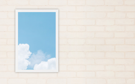 Closeup a window at wall of house with beautiful blue sky textured background with copy spaceの写真素材