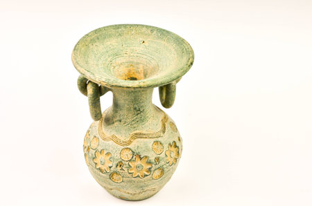 Old jar on white background の写真素材