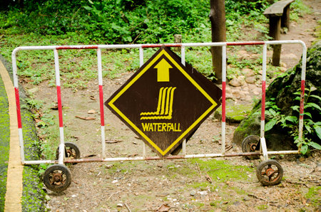 waterfall sign in erawan waterfall national park west of thailandの写真素材