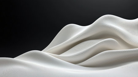 This abstract image features smooth white waves gracefully flowing on a dark background, embodying tranquility and elegance. Ideal for modern design projects.の素材