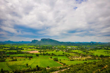 Fields, forests, mountains and blue sky.の写真素材