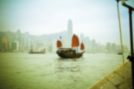 Junks floating in the middle of Hong Kong harbor. Abtract blur, out focus, Nearsightedness is not clear.の写真素材