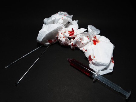Paper bloody syringes and instruments.の写真素材