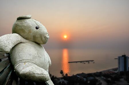 Sun rise Over the Beach Cha-Am in Thailand on the building of luxury. Then came the wake refreshed. The first light of a new dayの写真素材