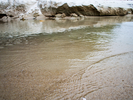 Green sea By the beach walkway The sea rushed to shore.の写真素材