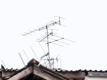 Radio reception antenna Installed on a high roof. Abstract background graphic.の写真素材