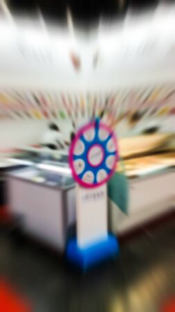 The trade fair, booth selling cheap goods from the manufacturer. A game show and giveaways. Abstract blurの写真素材