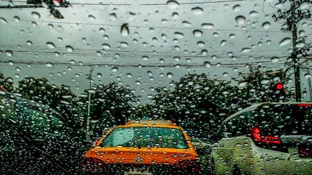 Summer storm brought heavy rains In the morning, causing traffic jams in the city.のeditorial素材