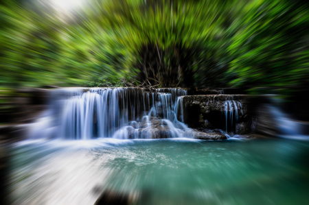 Waterfalls, emerald green water. Abstract blur zoom.の写真素材