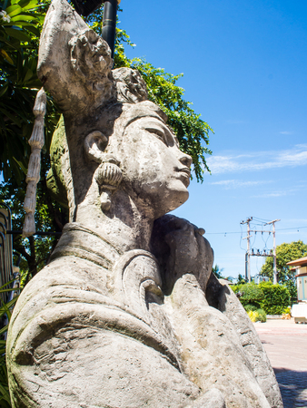 The sculpture carved beautiful women in traditional Chinese dress is ancient in garden. Photos zoom.のeditorial素材
