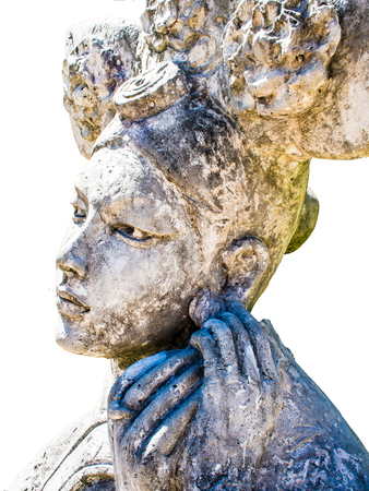 The sculpture carved beautiful women in traditional Chinese dress is ancient. Photos zoom.Abstract  isolate in white background.のeditorial素材