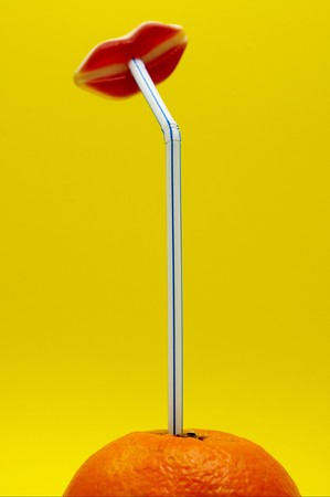 	 lips drinking orange juiceの写真素材