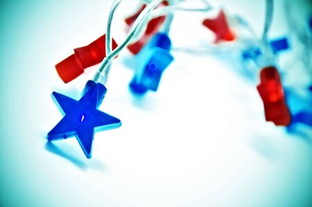  colored christmas stars on a white background の写真素材