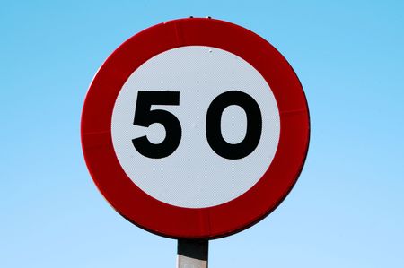 speed limit signs to 50 on blue skyの写真素材