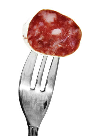 red spanish salami on a white backgroundの写真素材