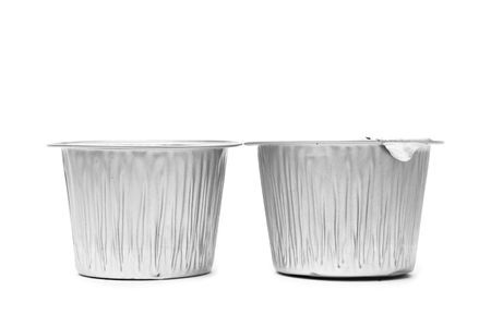 two packaged flan on a white backgroundの写真素材