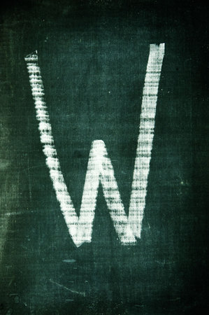 letter written with a chalk on a blackboardの写真素材
