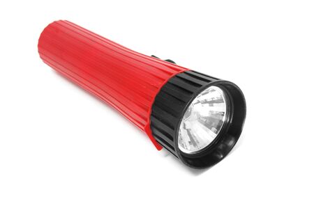 a red flashlight isolated on a white backgroundの写真素材