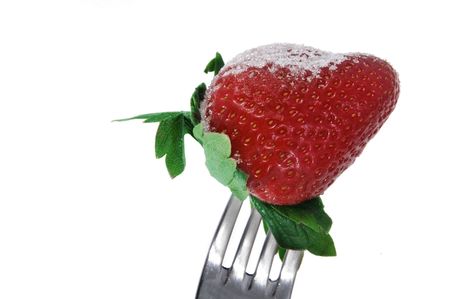 strawberry with sugar on a white backgroundの写真素材